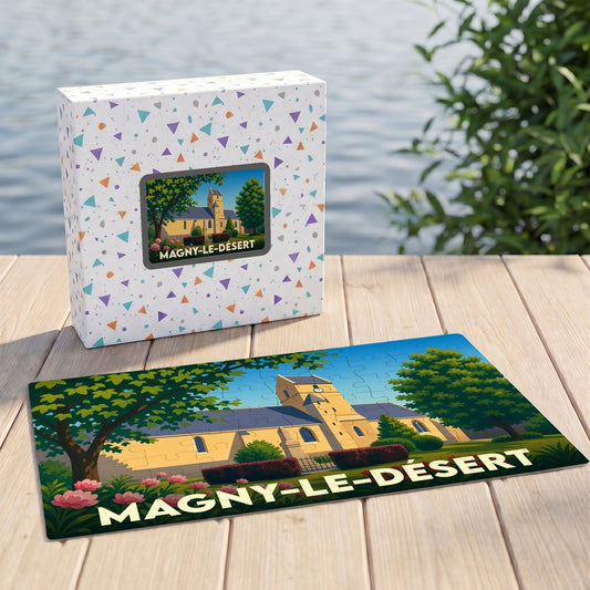 Puzzle souvenir de la ville de Magny-le-Désert avec une illustration stylisée d'une église, posé à côté de sa boîte.