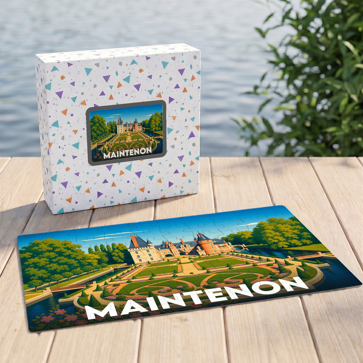 Puzzle souvenir de la ville de Maintenon avec une illustration stylisée du château et de ses jardins.