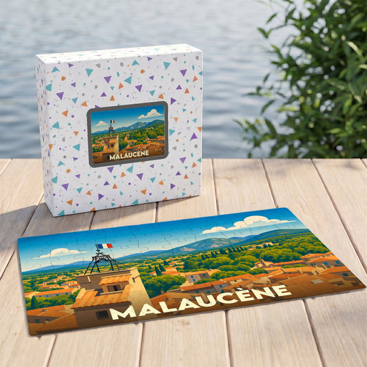 Puzzle souvenir de la ville de Malaucène avec une illustration stylisée d'un paysage provençal.