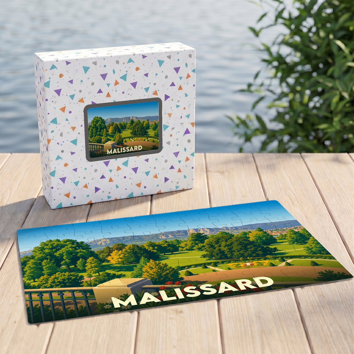 Puzzle souvenir de la ville de Malissard avec une illustration paysagère colorée.