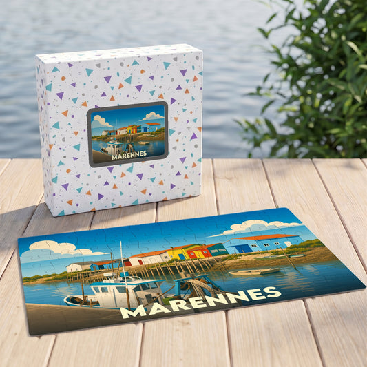 Puzzle souvenir de la ville de Marennes avec une illustration colorée d'un port de pêche et sa boîte assortie.