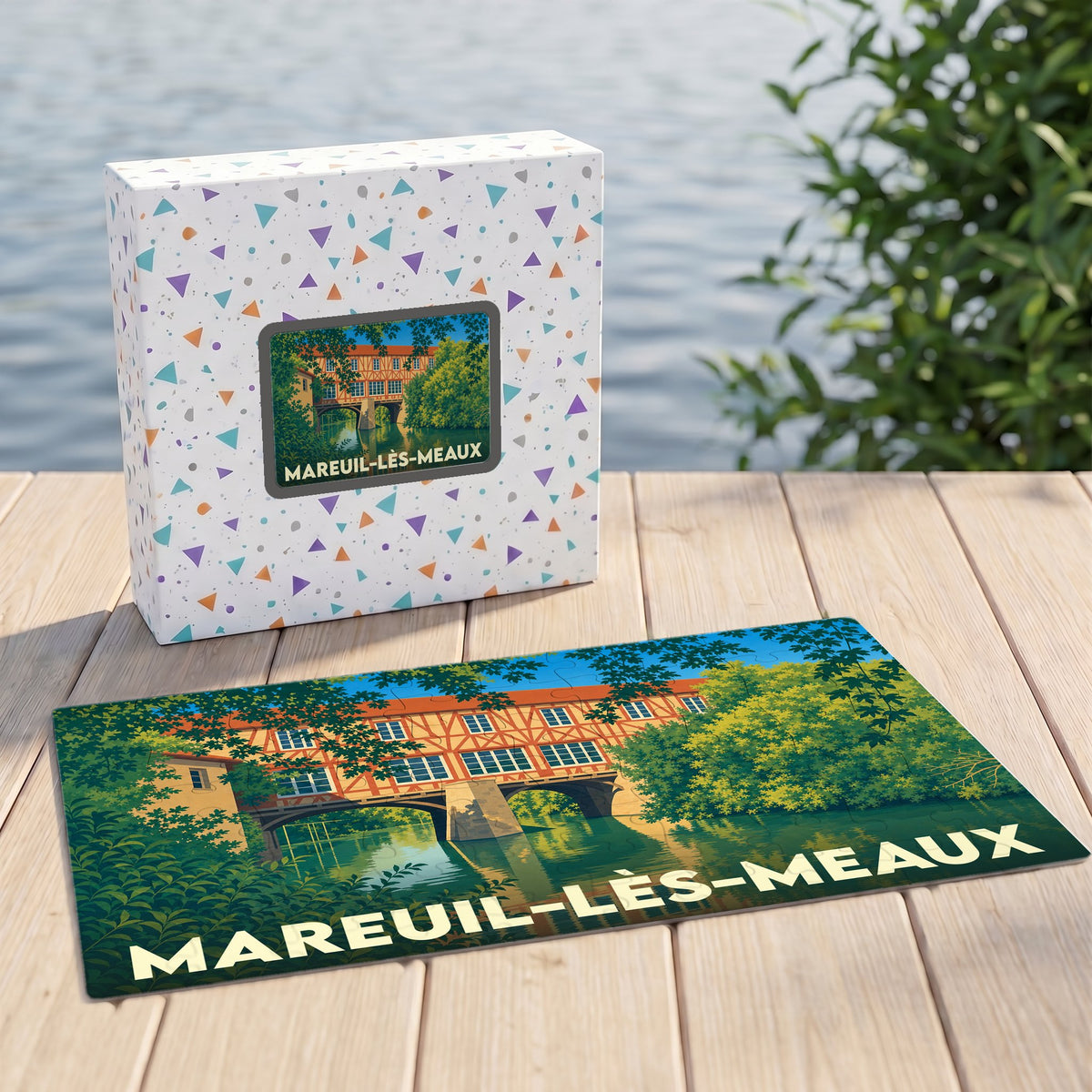 Puzzle souvenir de la ville de Mareuil-lès-Meaux avec une illustration stylisée d'un moulin sur l'eau.