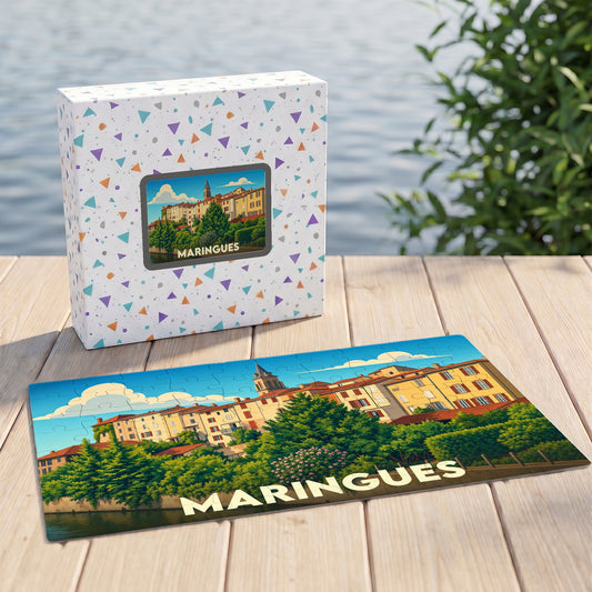 Puzzle souvenir de la ville de Maringues avec une illustration stylisée de ses bâtiments colorés en bord de rivière.