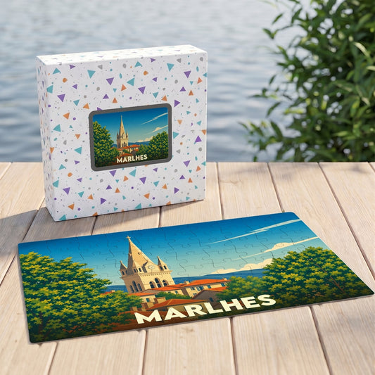 Puzzle souvenir de la ville de Marlhes avec une illustration stylisée du clocher et de son paysage.