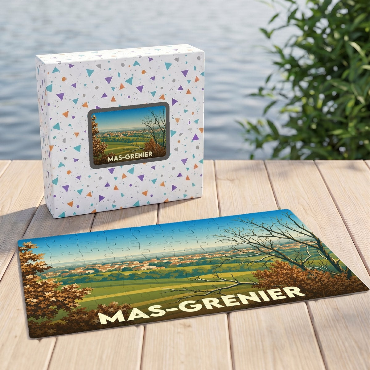 Puzzle souvenir de la ville de Mas-Grenier avec une illustration de paysage stylisée.
