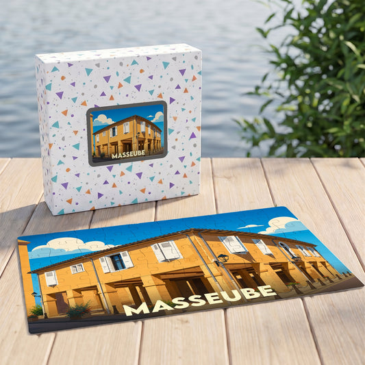 Puzzle souvenir de la ville de Masseube avec une illustration stylisée d'un bâtiment jaune typique.