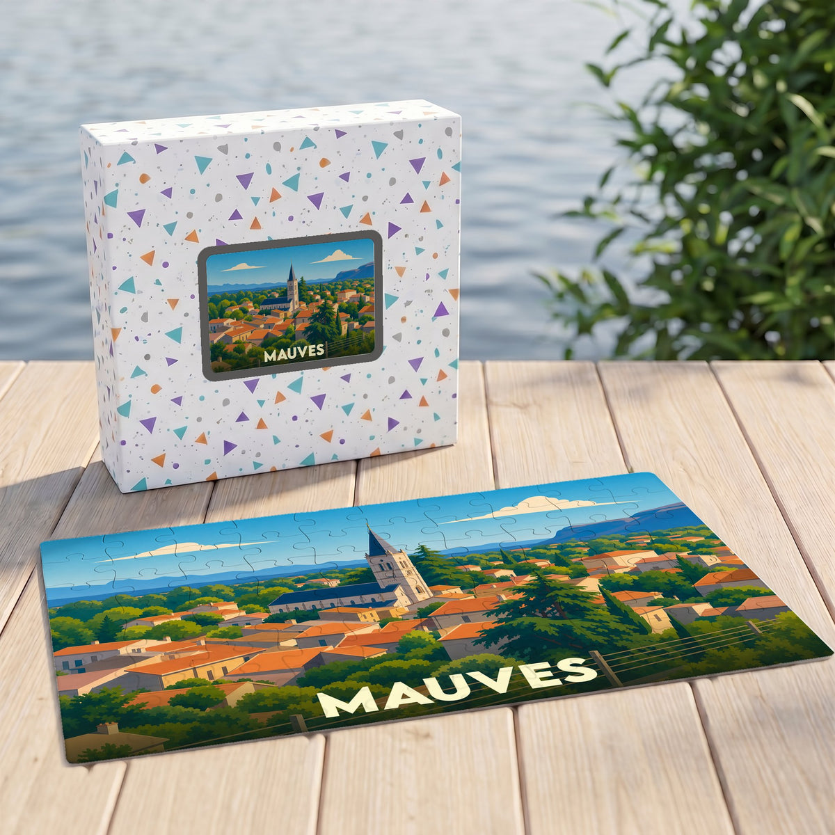 Puzzle souvenir de la ville de Mauves avec une illustration stylisée de ses toits et de son église.
