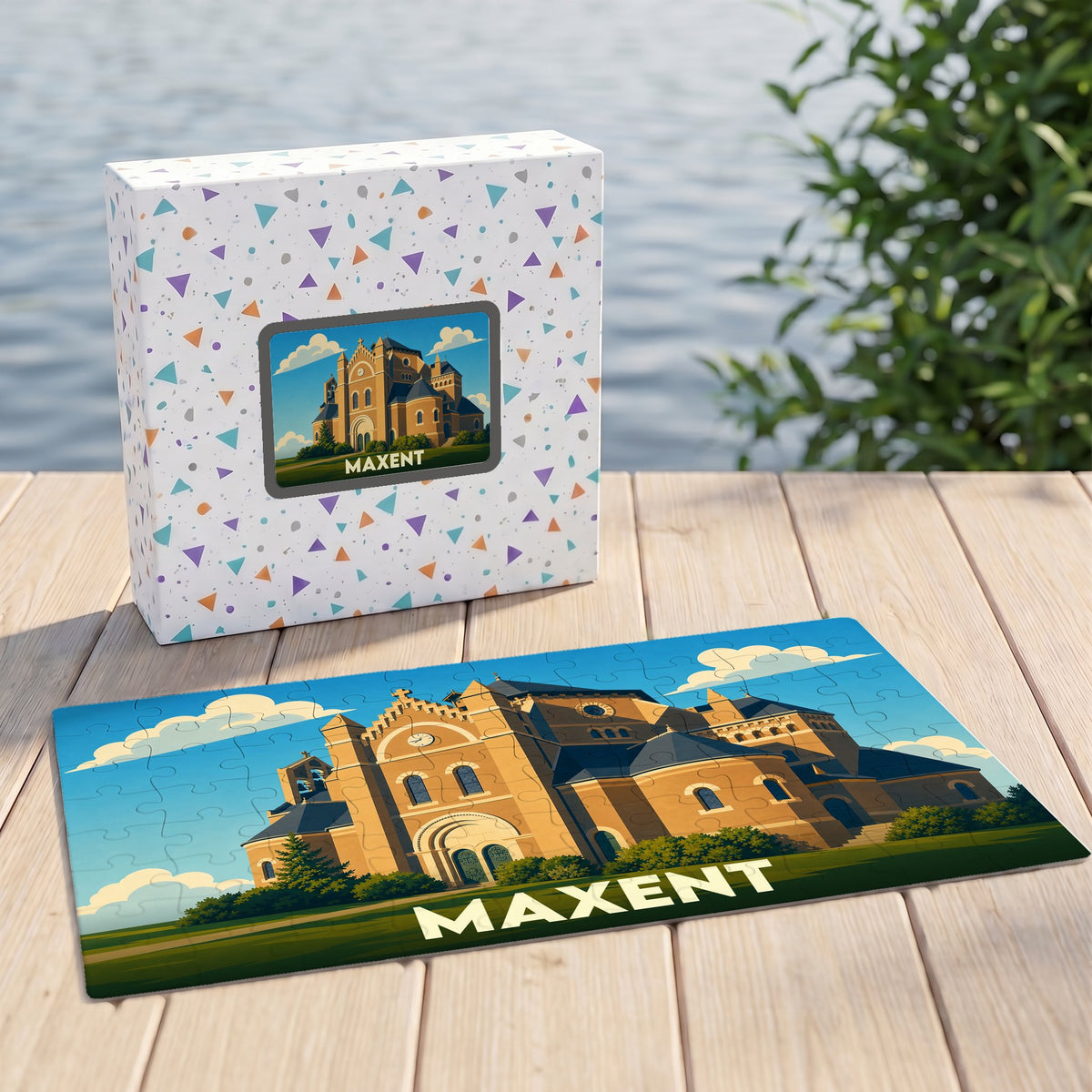 Puzzle souvenir de la ville de Maxent avec une illustration stylisée de son église.