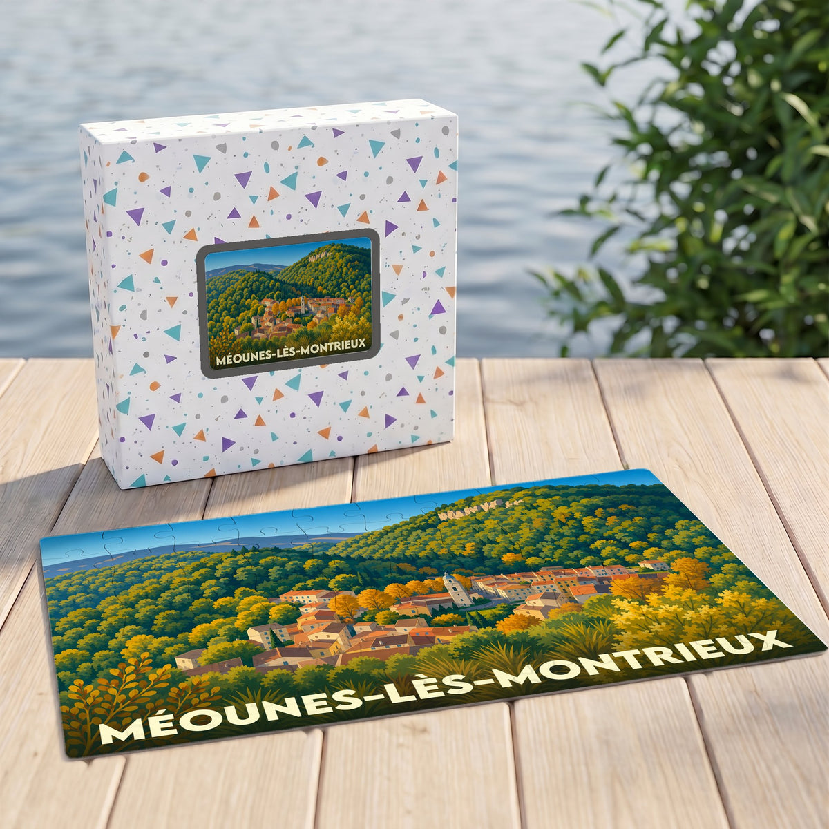 Puzzle souvenir de la ville de Méounes-lès-Montrieux avec une illustration stylisée de son paysage vallonné.