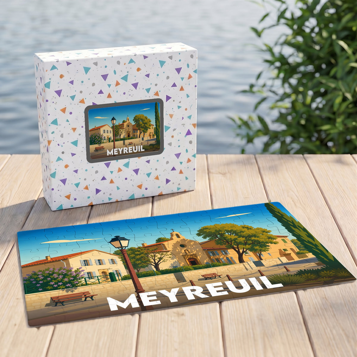 Puzzle souvenir de la ville de Meyreuil avec une illustration stylisée et sa boîte assortie.