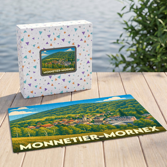 Puzzle souvenir de la ville de Monnetier-Mornex avec son illustration paysagère stylisée et sa boîte assortie.