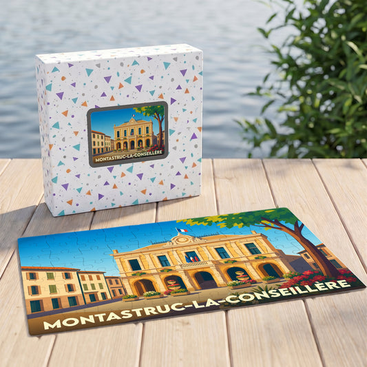 Puzzle souvenir de la ville de Montastruc-la-Conseillère avec une illustration stylisée de sa mairie.