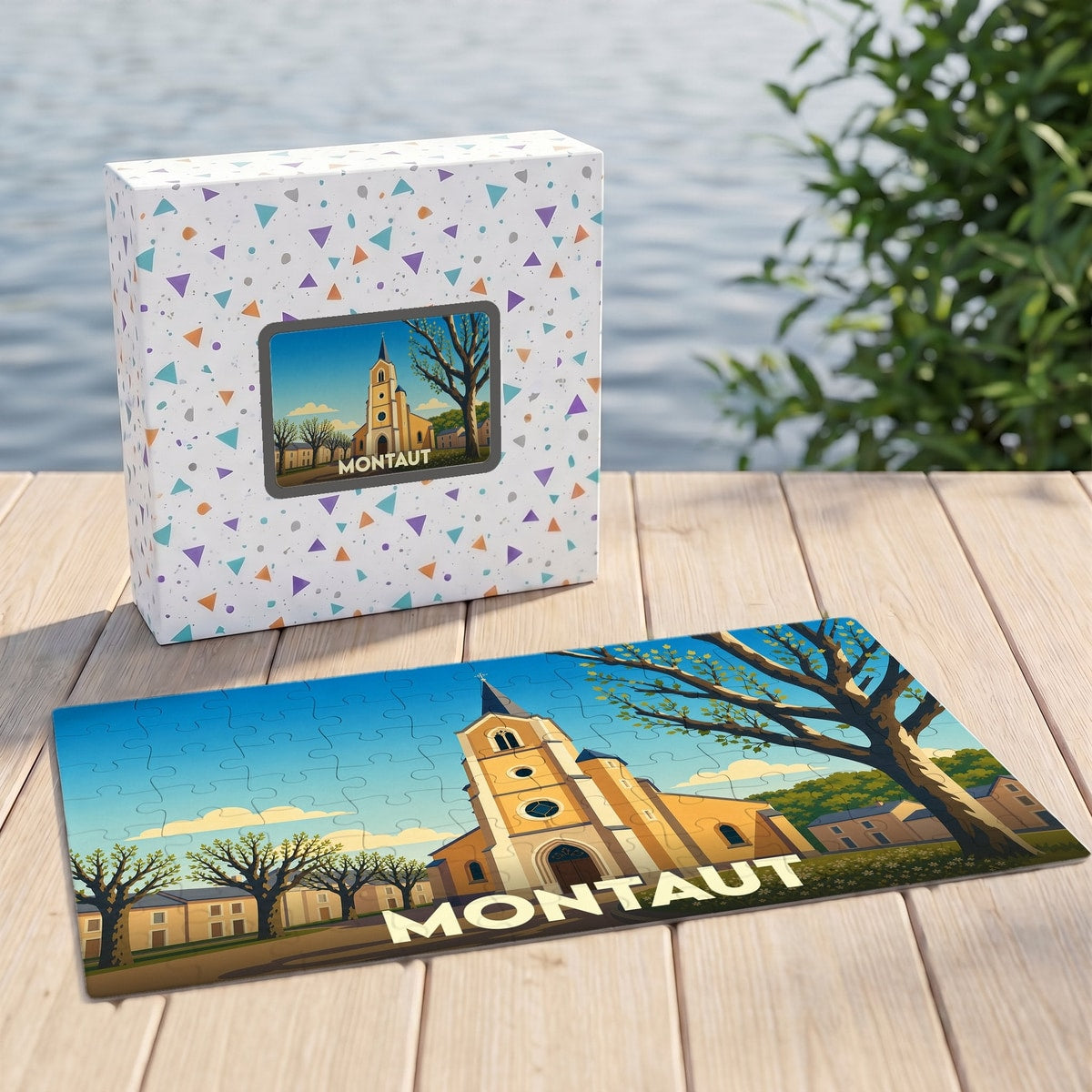 Puzzle souvenir de la ville de Montaut avec une illustration stylisée d'une église sous un ciel bleu.
