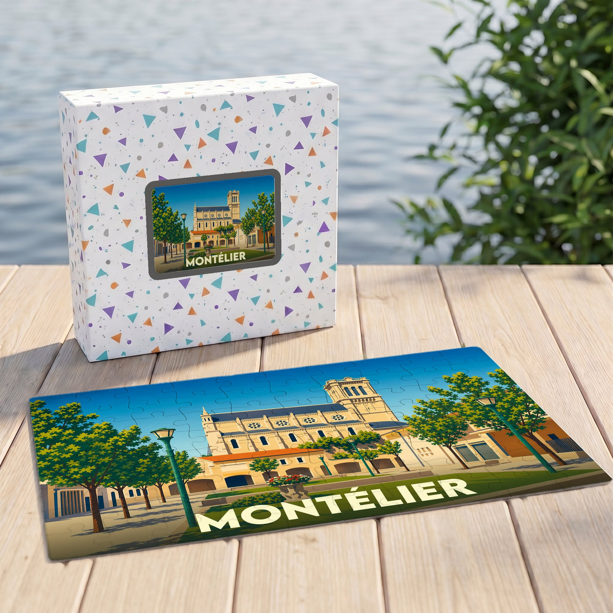 Puzzle souvenir de la ville de Montélier avec une illustration stylisée d'un bâtiment historique et d'un parc.