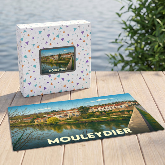Puzzle souvenir de la ville de Mouleydier avec une illustration stylisée d'un paysage fluvial.
