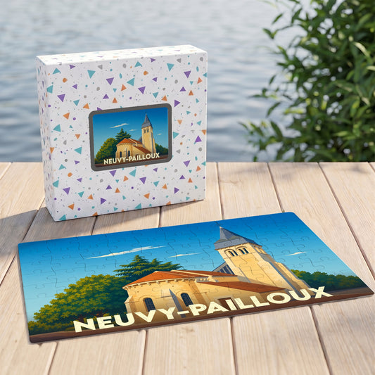 Puzzle souvenir de la ville de Neuvy-Pailloux avec une illustration stylisée d'une église sur sa boîte assortie.