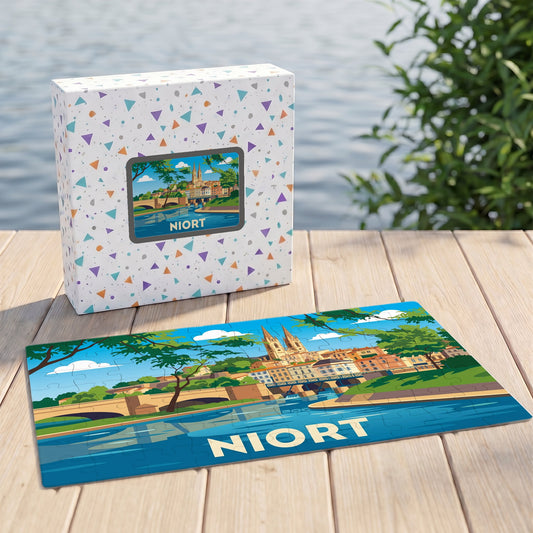 Puzzle souvenir de la ville de Niort avec une illustration stylisée du paysage urbain au bord de l'eau.