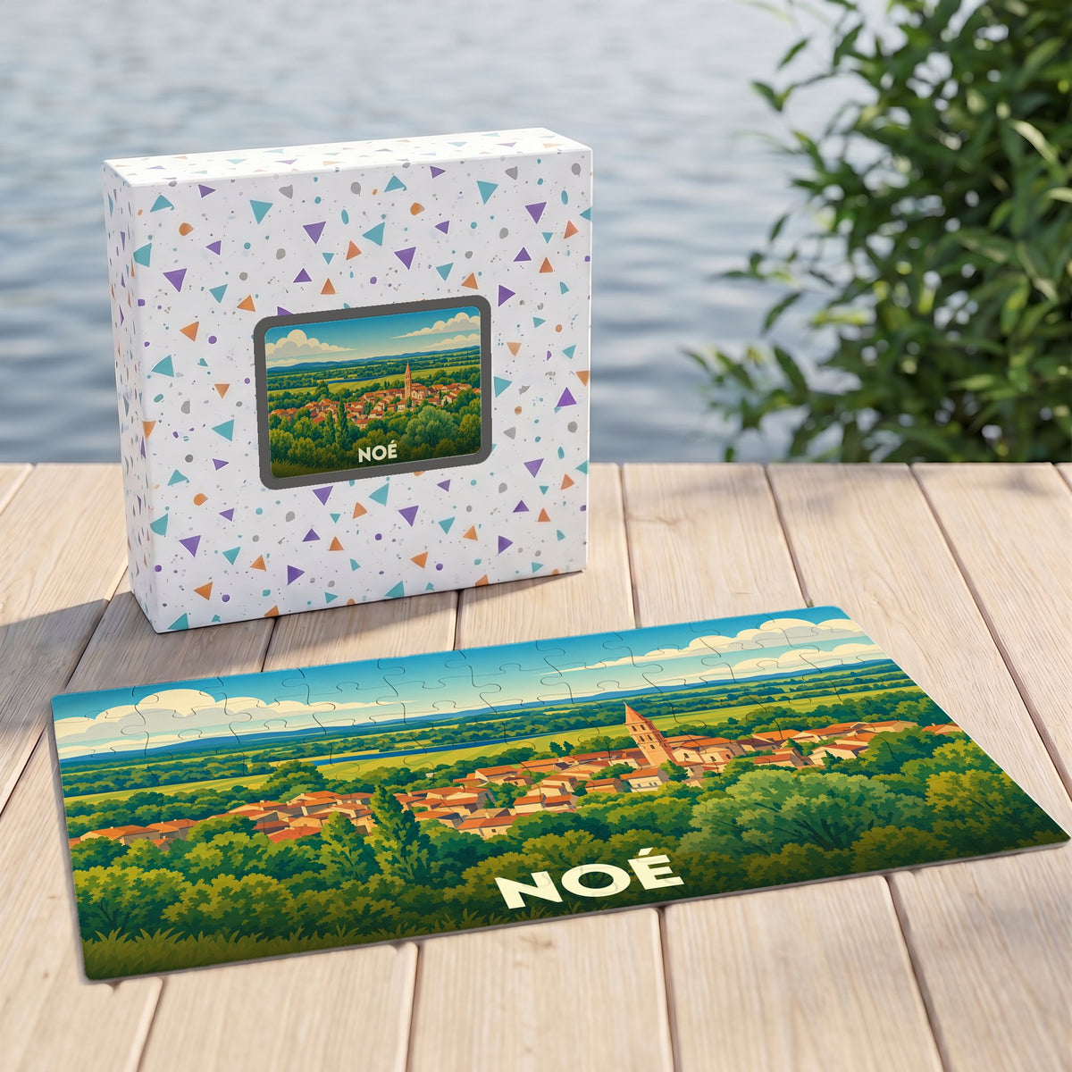 Puzzle souvenir de la ville de Noé avec une illustration stylisée d'un paysage champêtre.