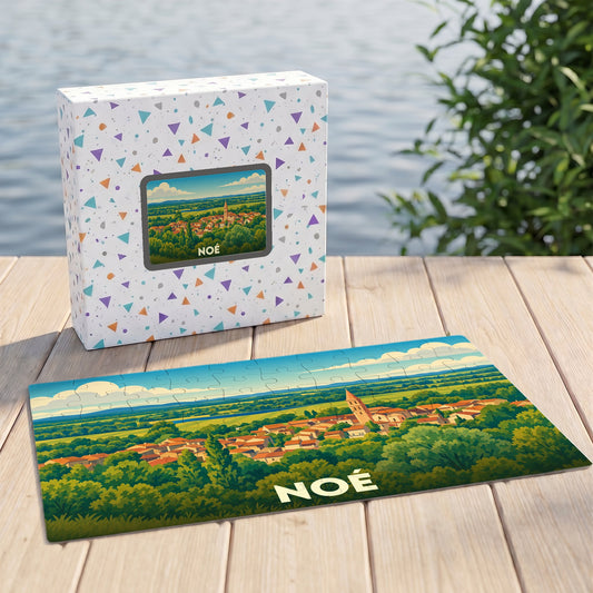 Puzzle souvenir de la ville de Noé avec une illustration stylisée d'un paysage champêtre.