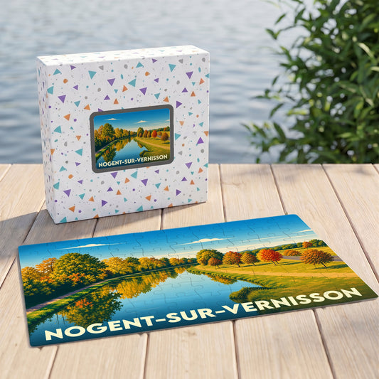 Puzzle souvenir de la ville de Nogent-sur-Vernisson avec une illustration automnale au bord de l'eau.