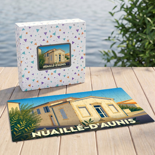 Puzzle souvenir de la ville de Nuaillé-d'Aunis avec une illustration stylisée d'un bâtiment local.