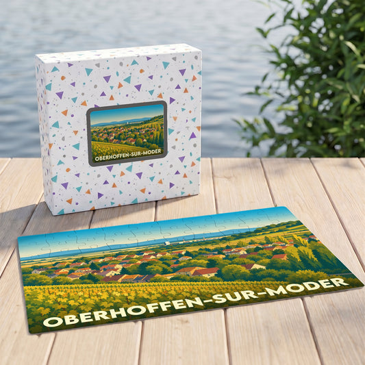Puzzle souvenir de la ville d'Oberhoffen-sur-Moder illustrant un paysage de village alsacien et de vignobles.