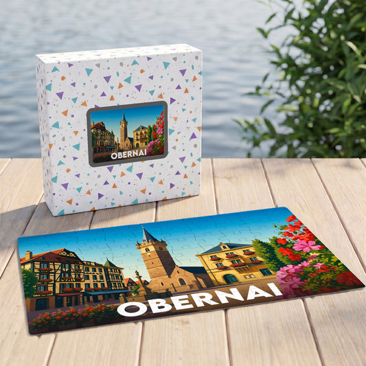 Puzzle souvenir de la ville d'Obernai avec une illustration colorée et stylisée de ses bâtiments emblématiques.