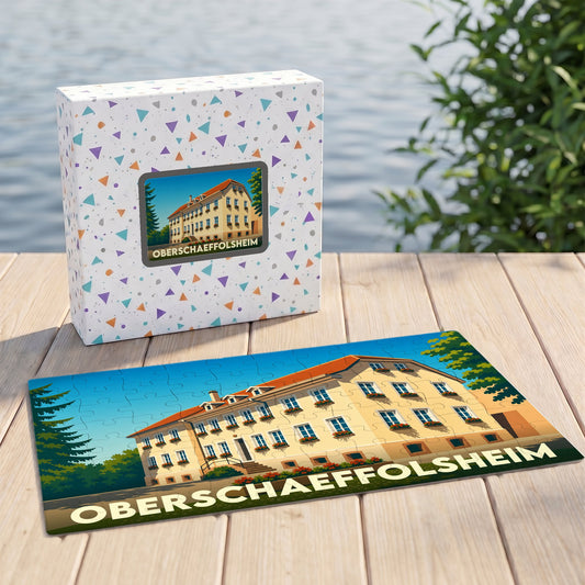 Puzzle souvenir de la ville de Oberschaeffolsheim avec une illustration stylisée d'un bâtiment traditionnel alsacien.