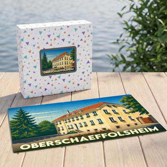 Puzzle souvenir de la ville d'Oberschaeffolsheim avec une illustration stylisée d'un bâtiment typique.
