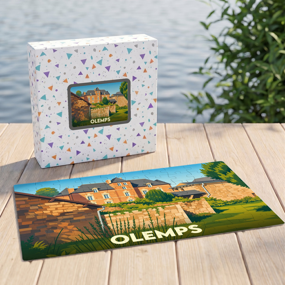 Puzzle souvenir de la ville d'Olemps avec une illustration stylisée d'un château et de ses remparts.