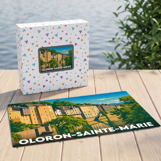 Puzzle souvenir de la ville d'Oloron-Sainte-Marie illustré d'un paysage urbain coloré au bord de l'eau.