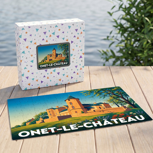 Puzzle souvenir de la ville de Onet-le-Château avec une illustration stylisée d'un château.