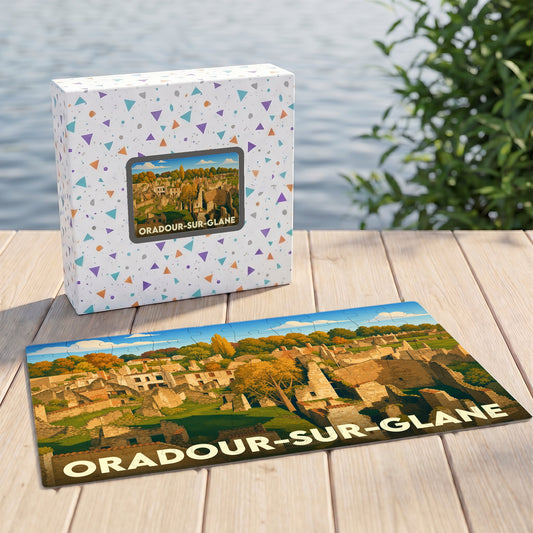 Puzzle souvenir de la ville d'Oradour-sur-Glane avec une illustration stylisée de ses ruines historiques.