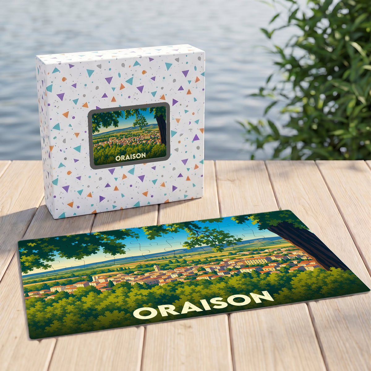 Puzzle souvenir de la ville de Oraison avec une illustration stylisée d'un paysage provençal.