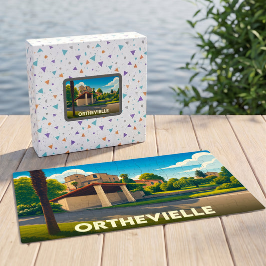 Puzzle souvenir de la ville d'Orthevielle avec une illustration stylisée d'un paysage local.