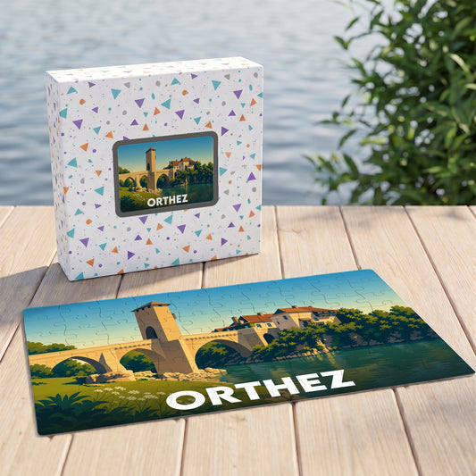 Puzzle souvenir de la ville d'Orthez avec une illustration stylisée de son célèbre Pont Vieux.