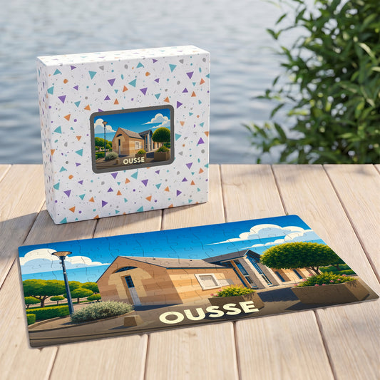 Puzzle souvenir de la ville d'Ousse avec une illustration stylisée d'un bâtiment sous un ciel bleu.