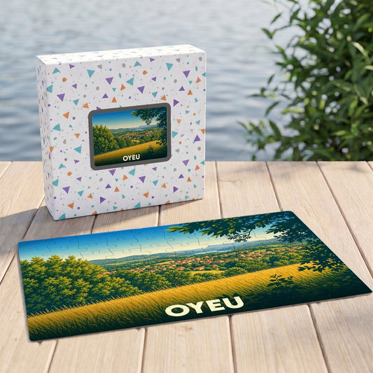 Puzzle souvenir de la ville de Oyeu représentant un paysage de collines illustré.