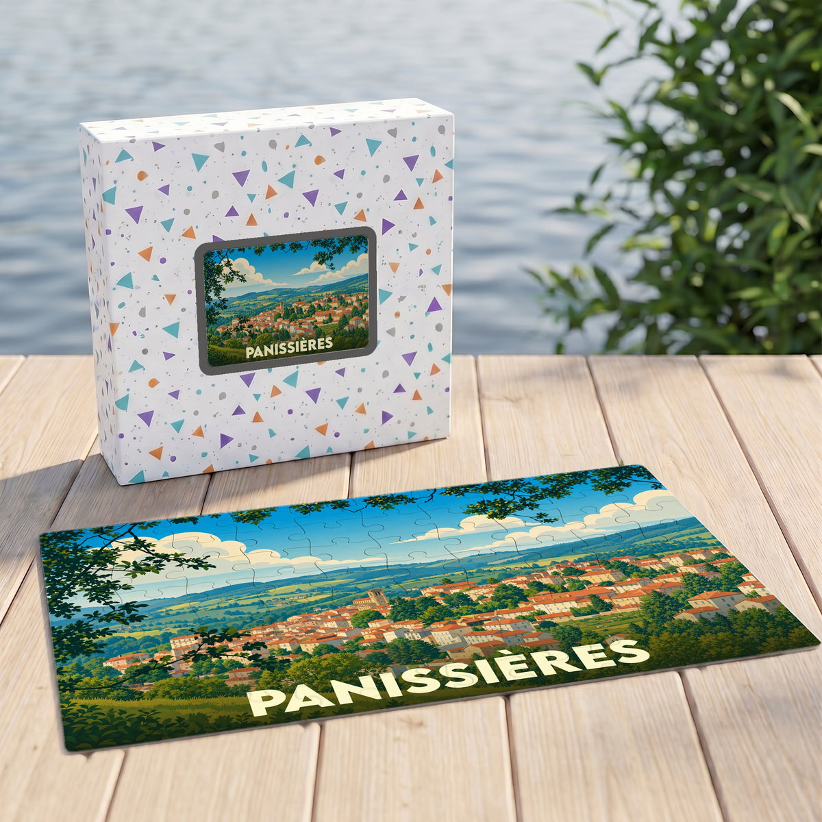 Puzzle souvenir de la ville de Panissières avec une illustration panoramique stylisée.