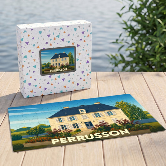 Puzzle souvenir de la ville de Perrusson avec une illustration stylisée d'une grande demeure.