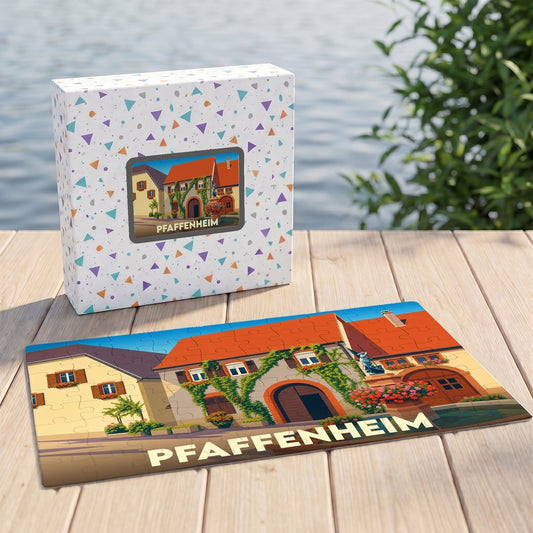 Puzzle souvenir de la ville de Pfaffenheim avec une illustration stylisée d'une maison alsacienne fleurie.