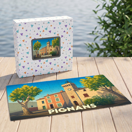 Puzzle souvenir de la ville de Pignans avec une illustration stylisée d'une place ensoleillée.