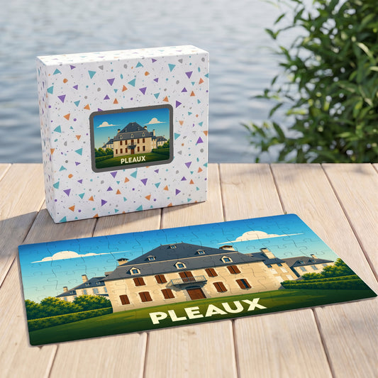 Puzzle souvenir de la ville de Pleaux avec une illustration stylisée d'un manoir.