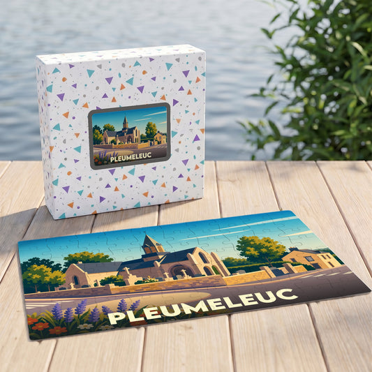 Puzzle souvenir de la ville de Pleumeleuc avec une illustration stylisée d'une église bretonne.