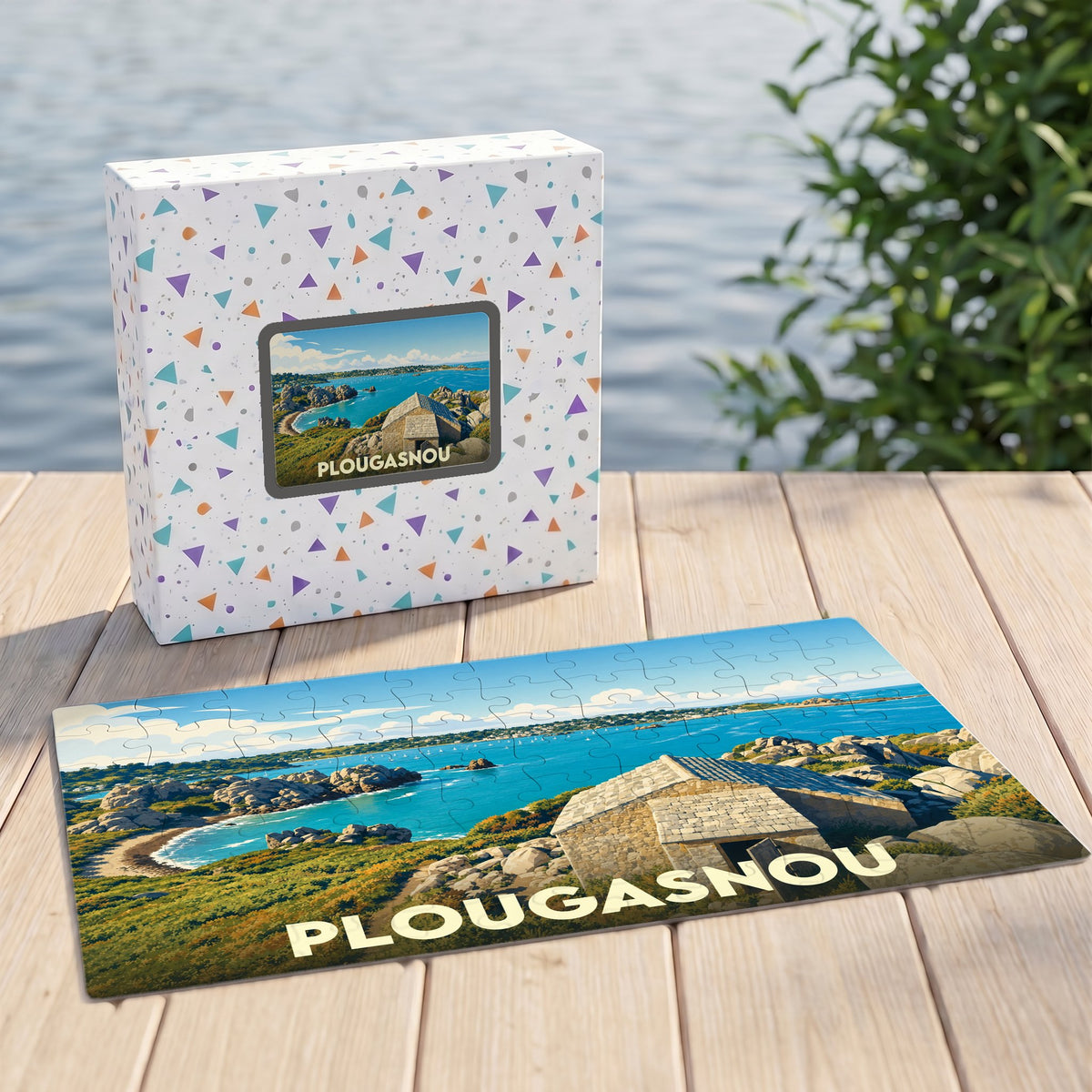 Puzzle souvenir de la ville de Plougasnou présentant une illustration côtière stylisée.
