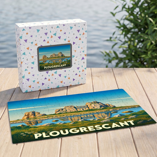 Puzzle souvenir de la ville de Plougrescant avec une illustration stylisée d'une maison entre deux rochers.