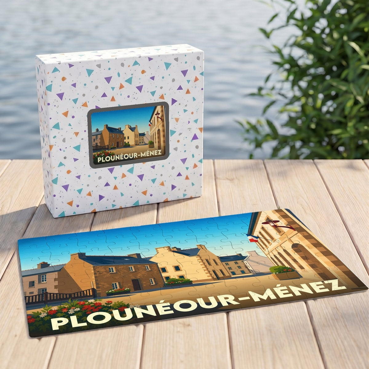 Puzzle souvenir de la ville de Plounéour-Ménez avec une illustration de ses maisons typiques.