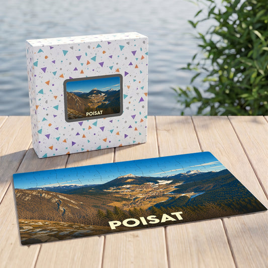 Puzzle souvenir de la ville de Poisat avec une illustration de paysage montagneux.