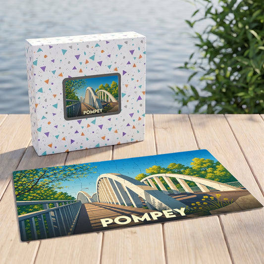 Puzzle souvenir de la ville de Pompey avec une illustration stylisée représentant un pont.
