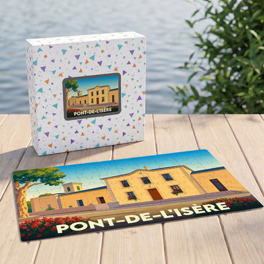 Puzzle souvenir de la ville de Pont-de-l'Isère avec une illustration stylisée d'un bâtiment provençal.
